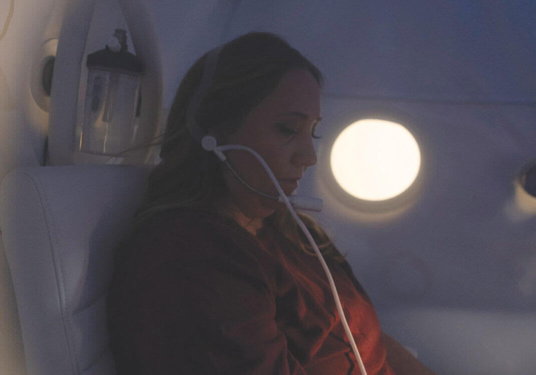 James Clinic woman sitting inside hyperbaric oxygen chamber